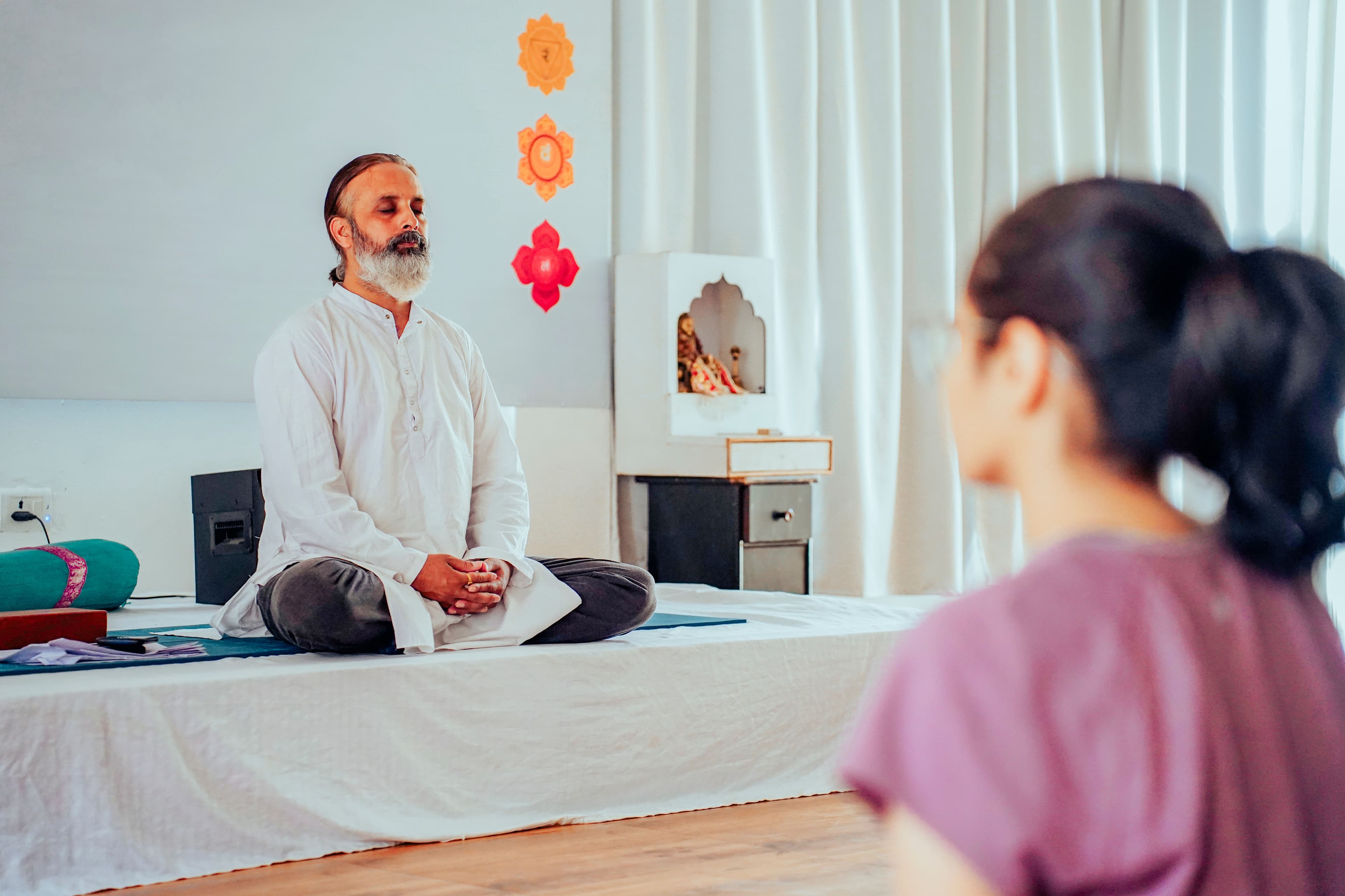 Yoga practice in a bright studio